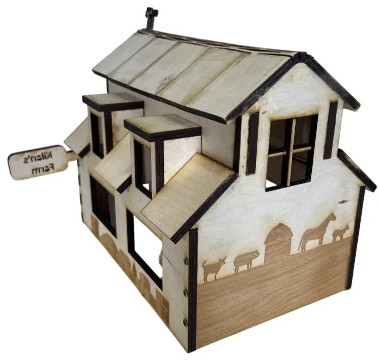 Finished barn from the back-right with engraved farm animals along the lower wall