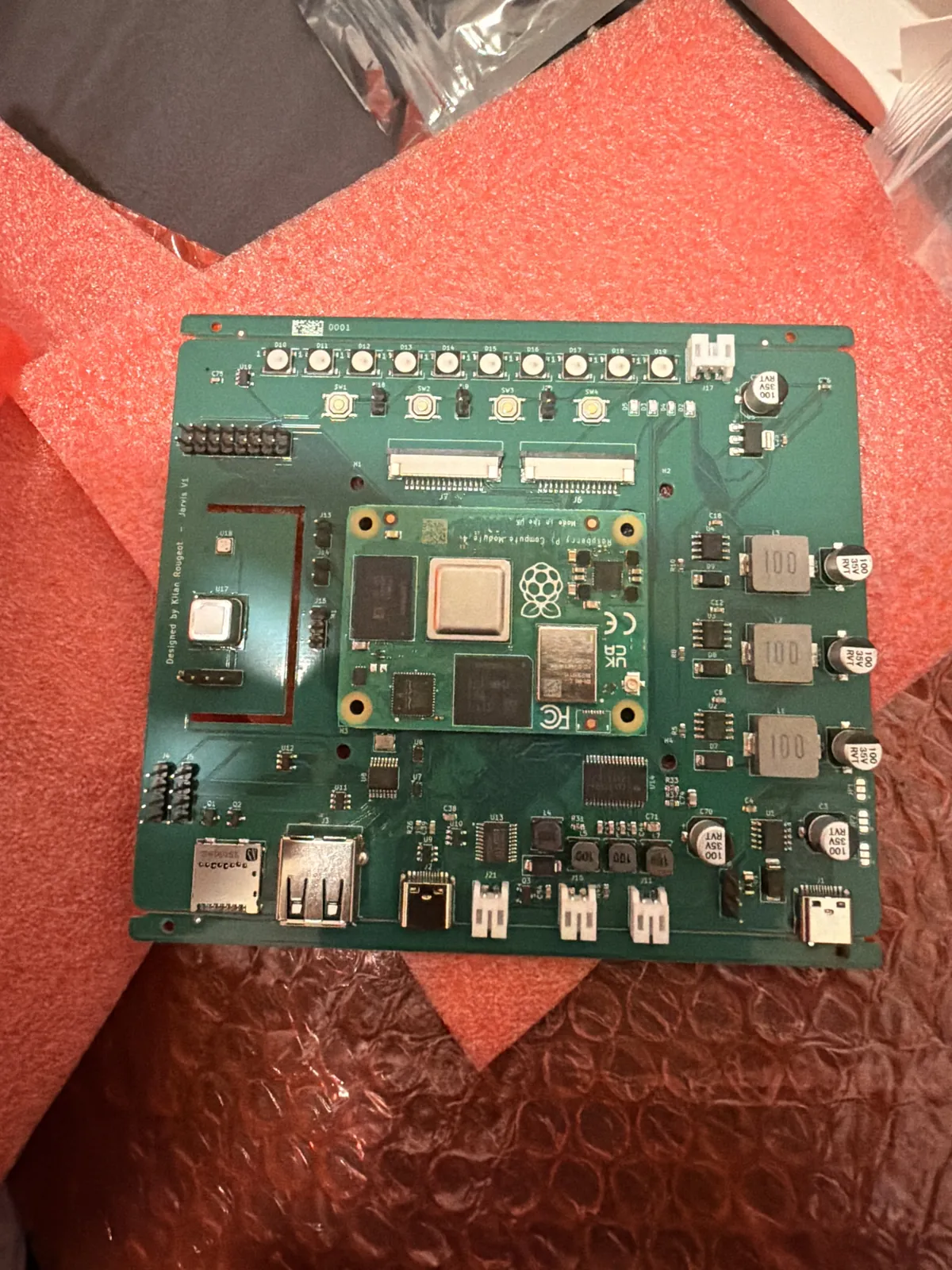 The rev A board on bubble wrap with the Compute Module 4 fitted on its sockets, before the heatsink went on