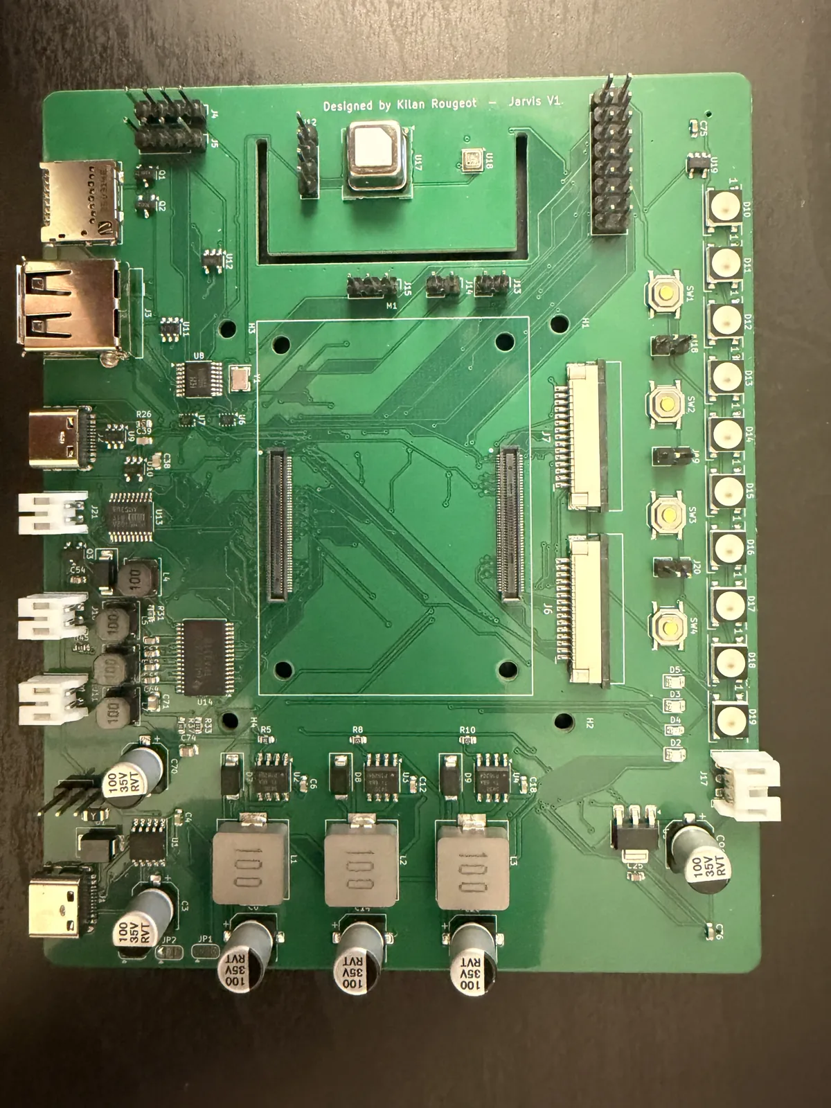 Top side of the populated rev A HomeDeck board on a dark desk, without the Compute Module fitted