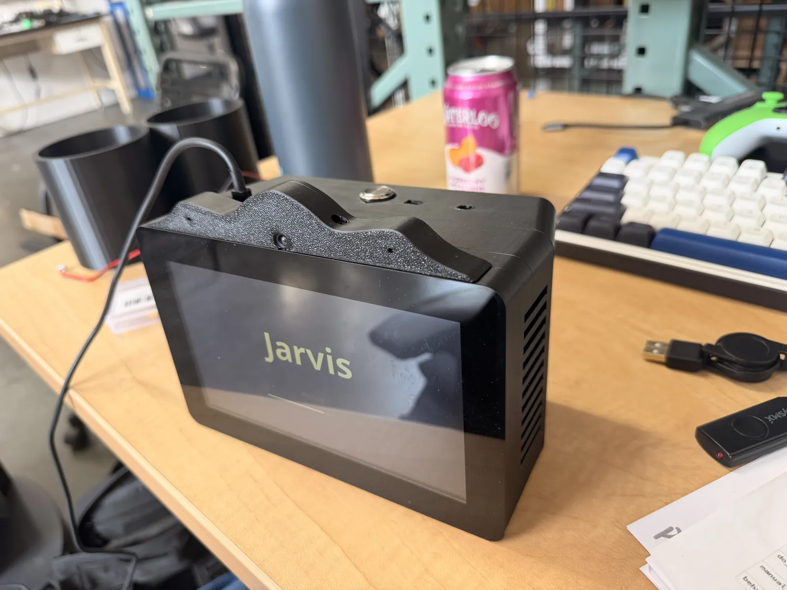 The finished HomeDeck on a desk showing the Jarvis boot screen
